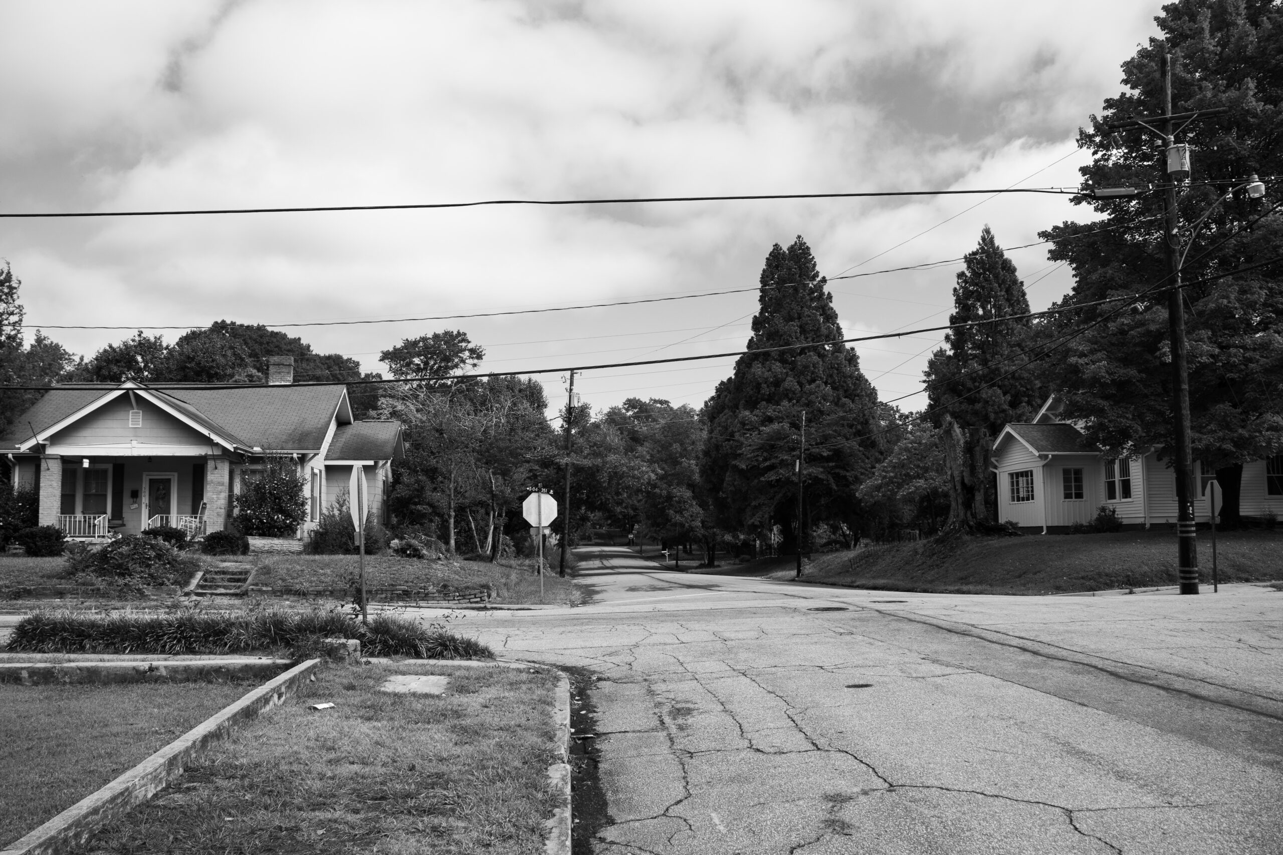 A black and white image of a middle-income neighborhood.