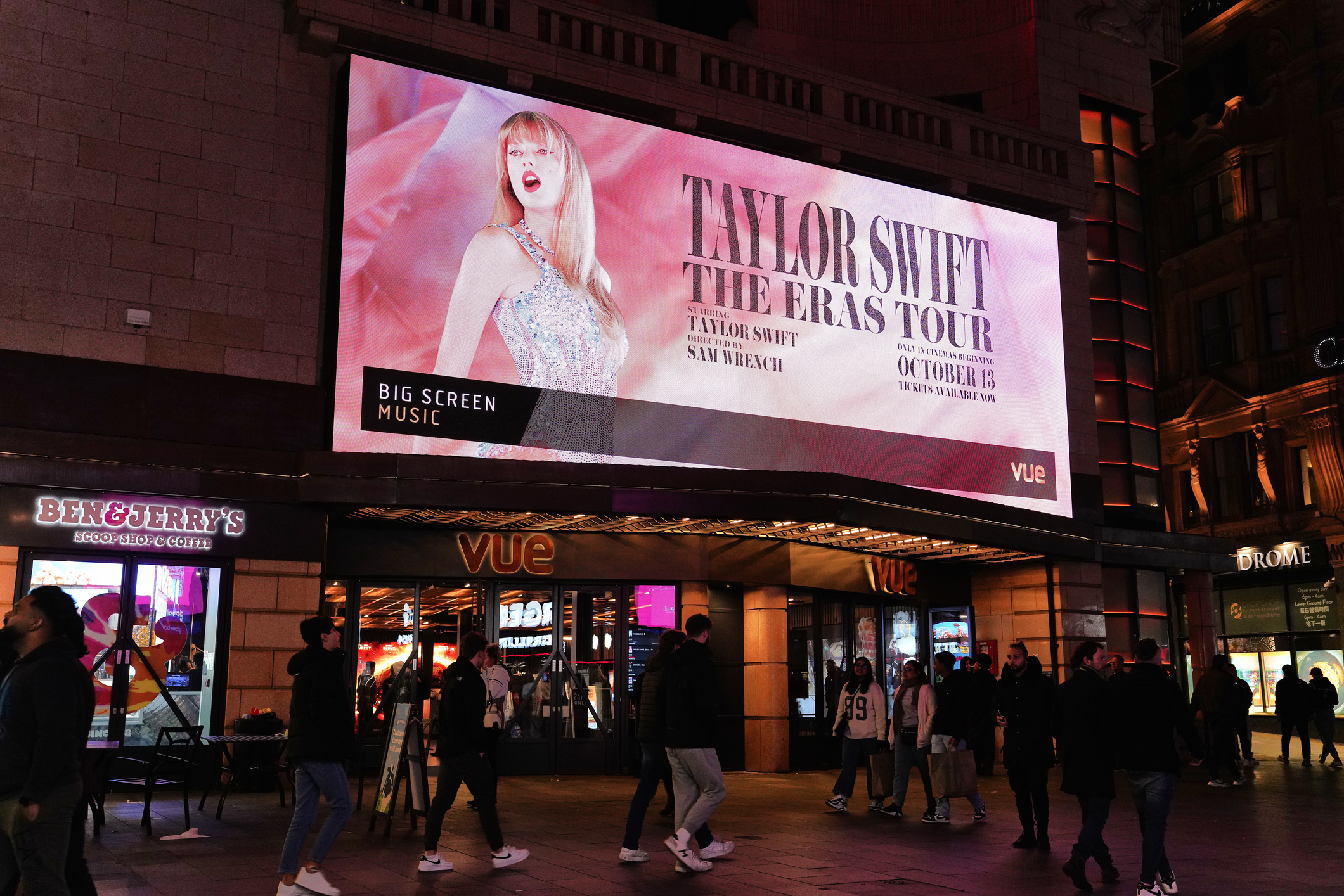 A photograph of a billboard of Taylor Swift's Eras Tour