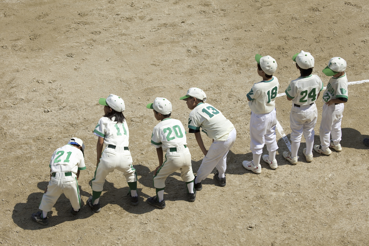 Church and sports: Boys playing league baseball